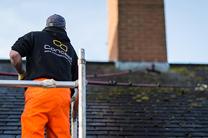 Roof Cleaning Milton Keynes - Scraping A Slate Roof